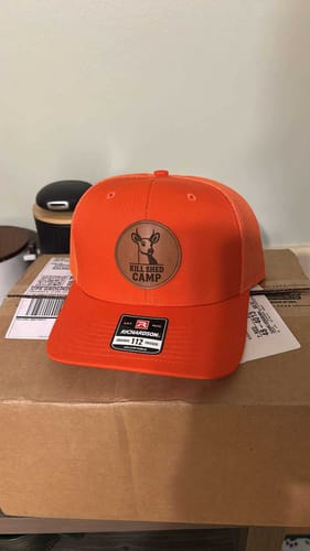 Customer photo review of Custom Leather Patch Trucker Hat - Richardson 112