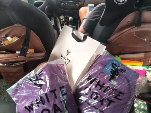 Customer photo review of 5-Pocket MoveTech® Scrub Top - Women / Plum