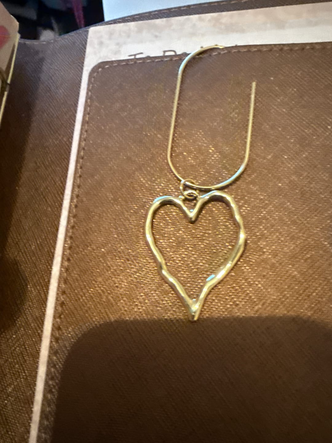 Customer photo review of Abstract Open Heart Charm GOLD – Lead With Love