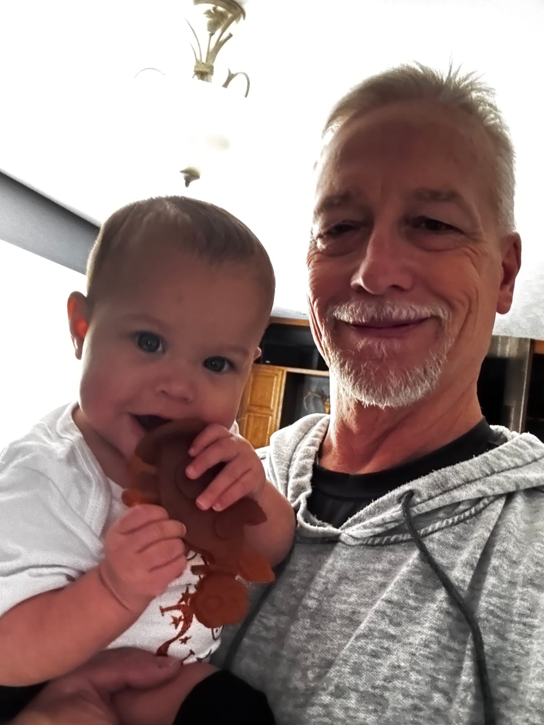 Customer photo review of Dibly Amber - Baltic Amber & Natural Rubber Dinosaur Teether with Toothbrush Tail