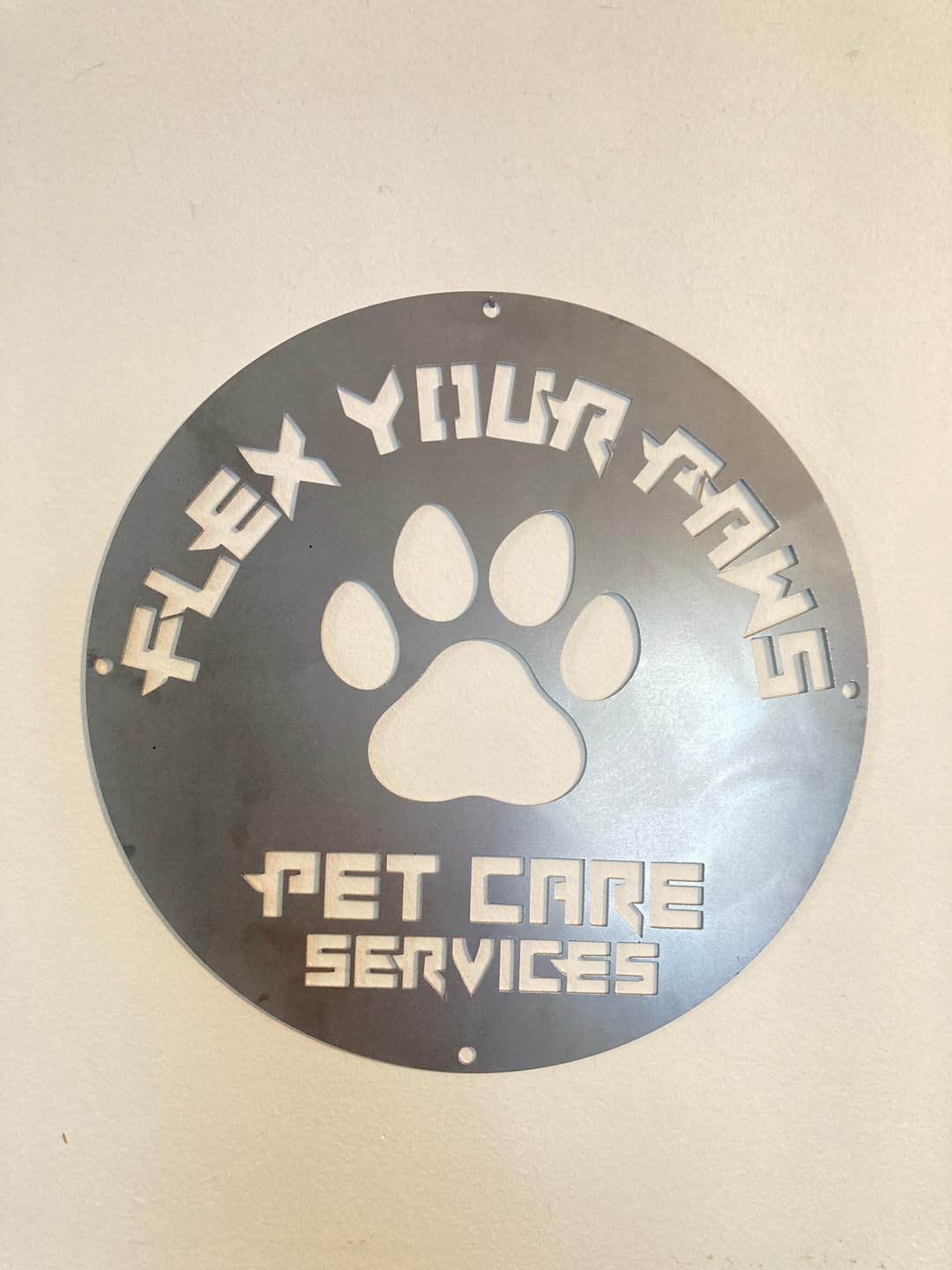 Customer photo review of Custom Metal Business Logo Sign – Personalized Laser-Cut Wall Art for Office or Shop
