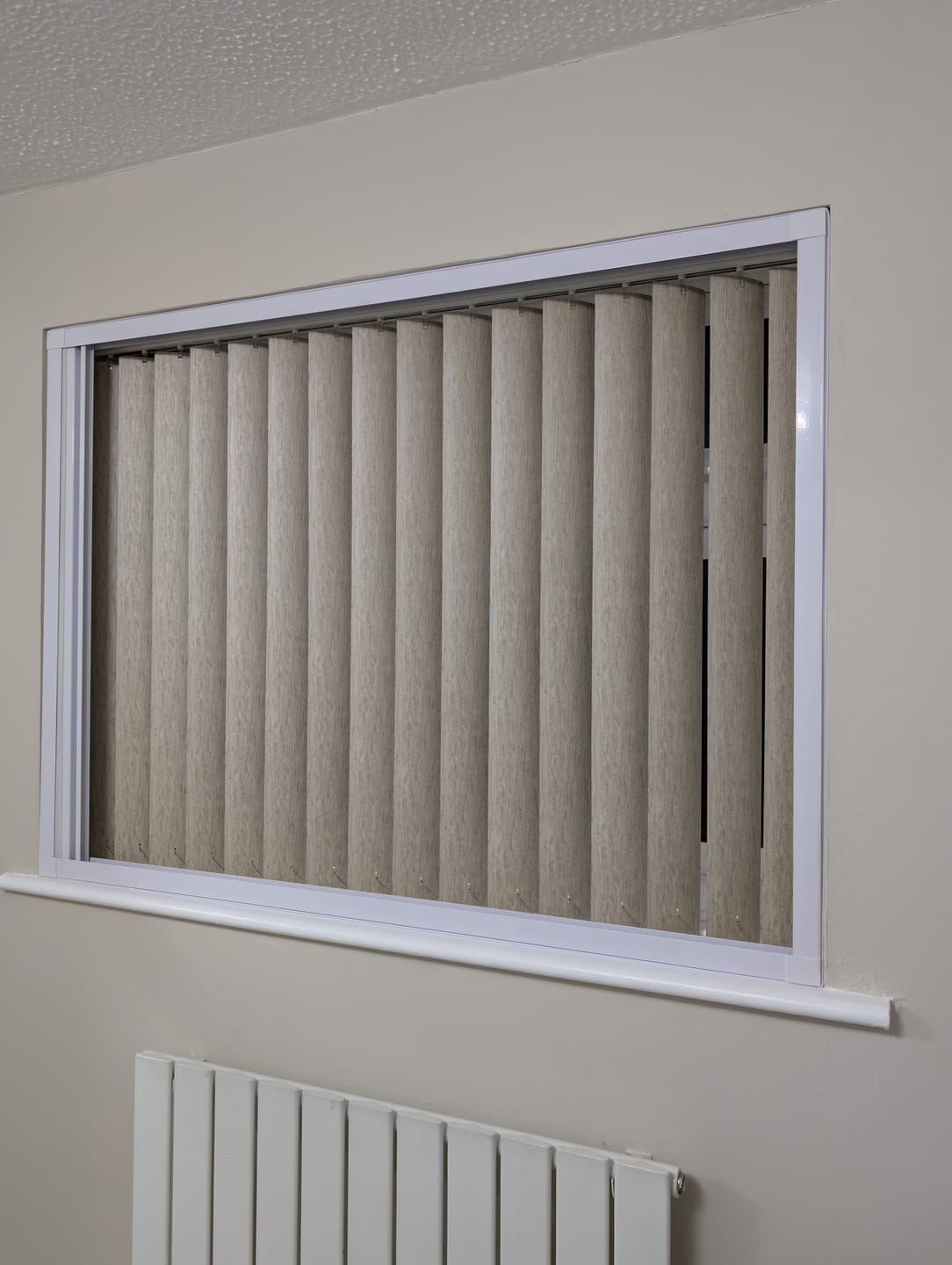 Customer photo review of Atakama Champagne Blackout PVC Vertical Blinds