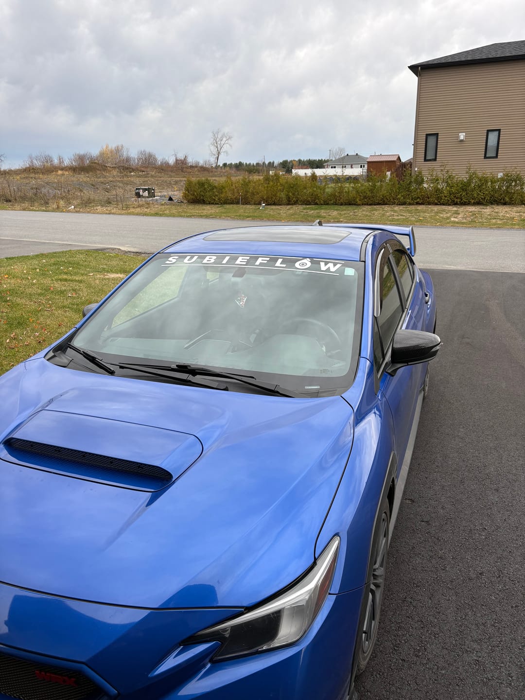 Customer photo review of SubieFlow Windshield Banners