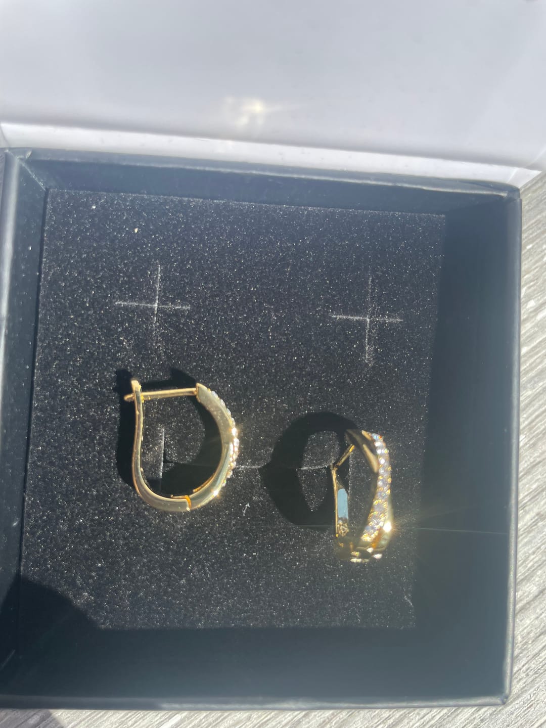 Customer photo review of Amaya 18k White Gold Plated 16mm Twisted Hoop Earrings with Swarovski Crystals