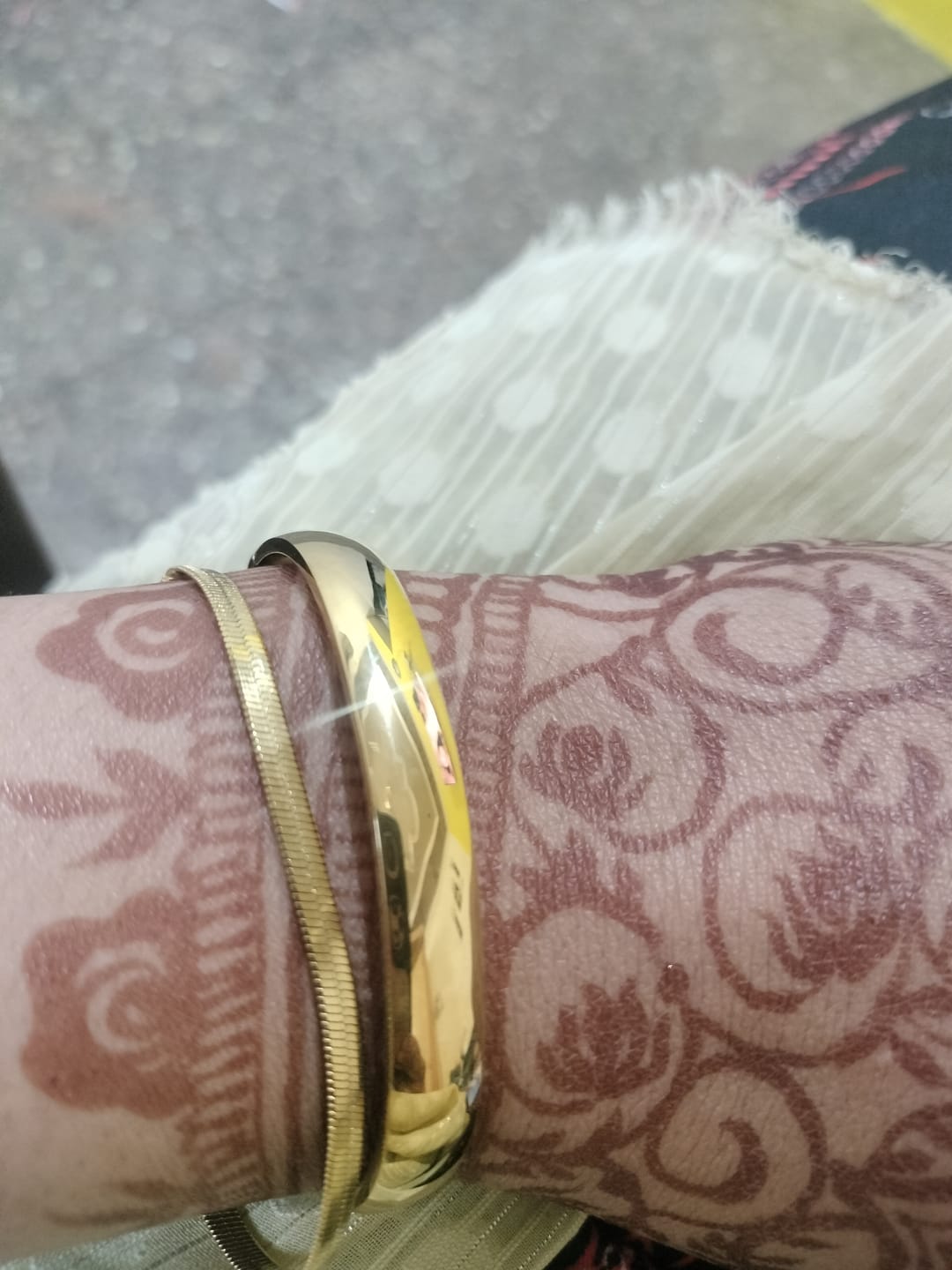 Customer photo review of Plain Gold Bangle Bracelet - 7 mm