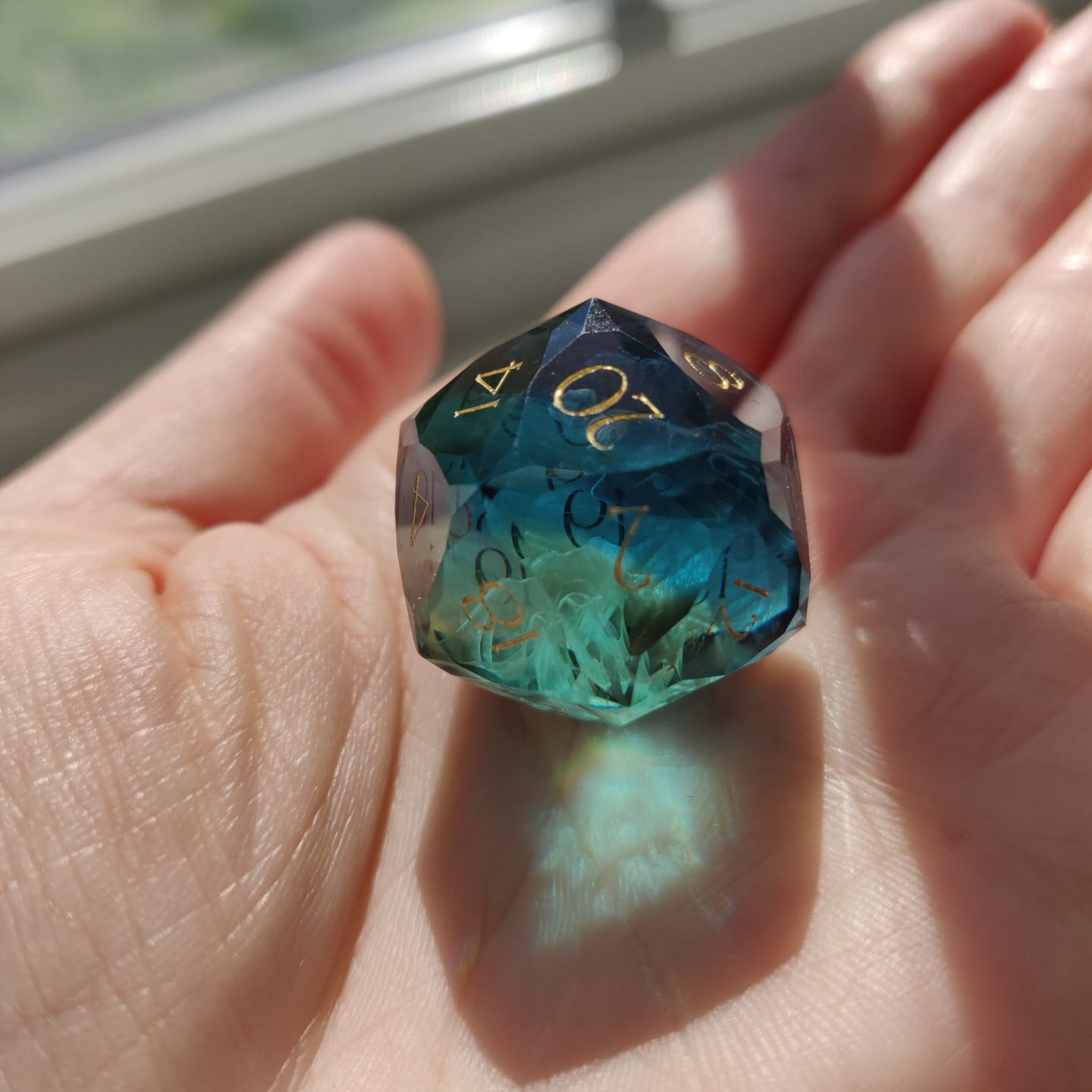 Customer photo review of URWizards D&D Resin Tidebound Fate Engraved Dice Set Multi-faceted Style