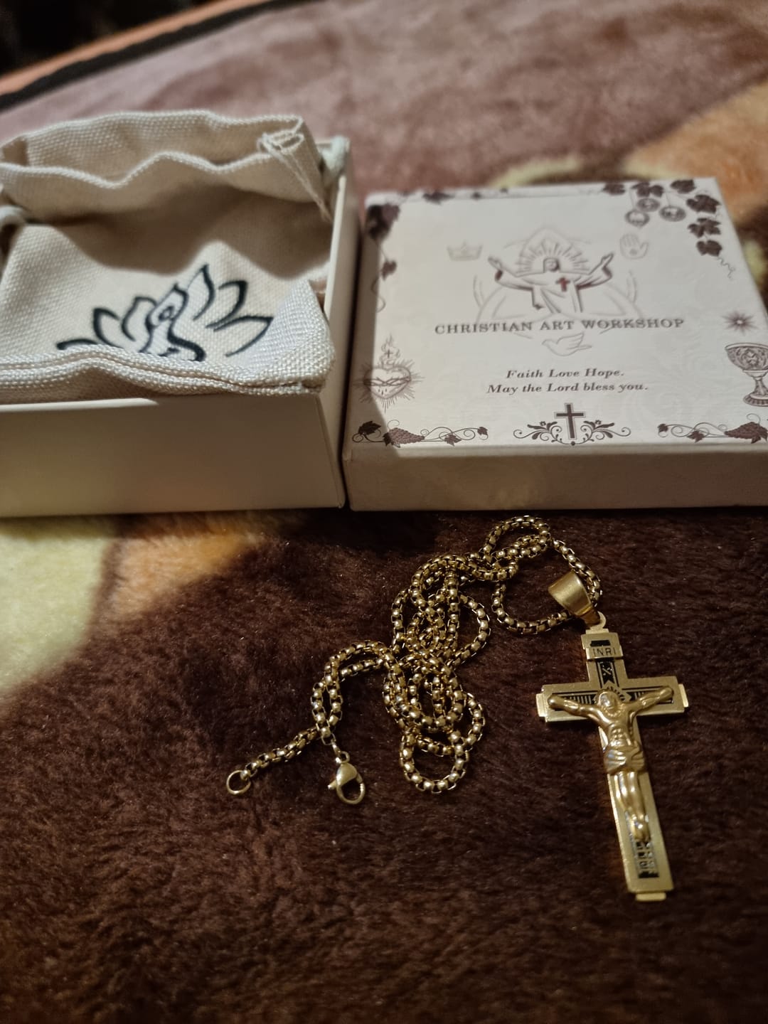 Customer photo review of Christianartworkshop Crafted Jesus Christianartworkshop Crucifix Titanium Necklace