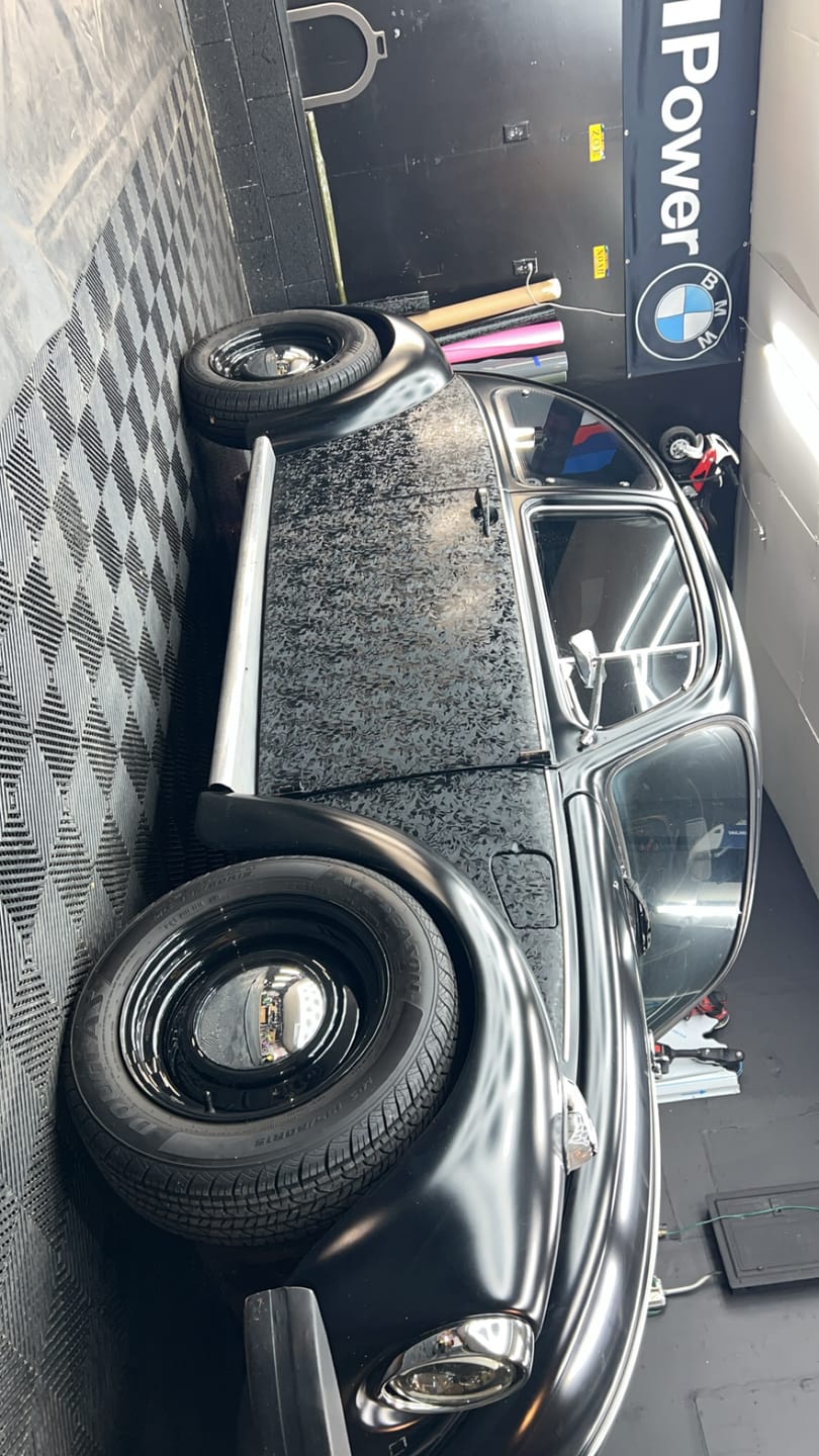 Customer photo review of Shadow Forged Black Carbon Fiber Vinyl Wrap
