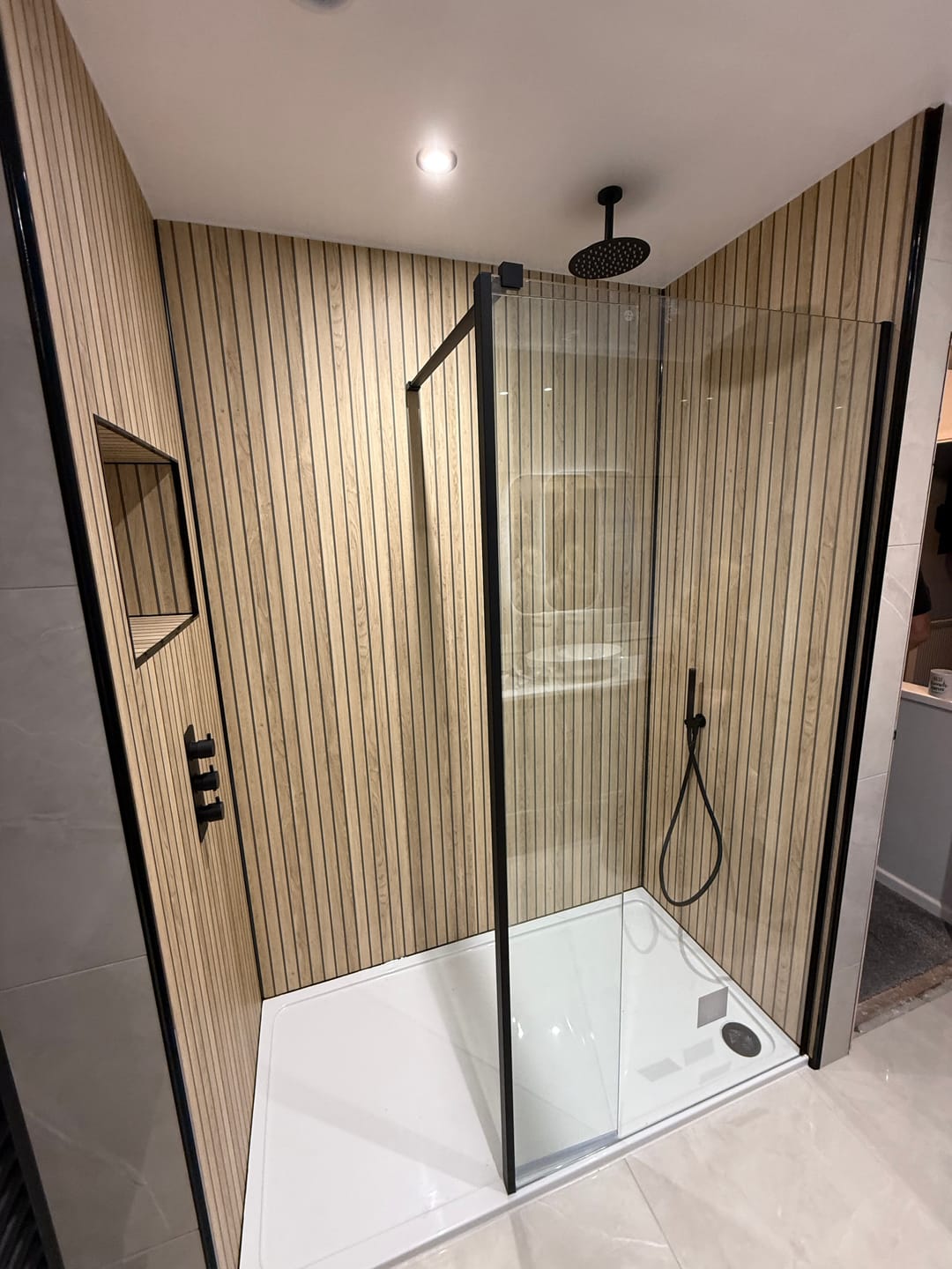 Customer photo review of Sivara Oak Slatted Wood Effect PVC Shower Panel