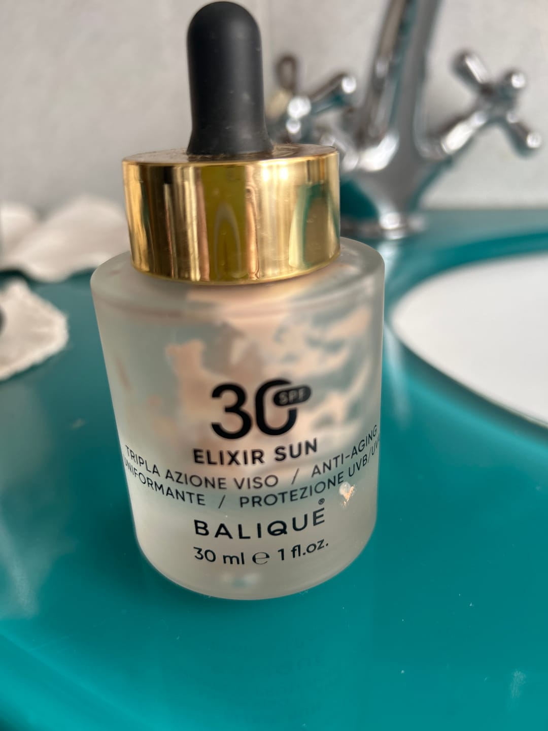 Customer photo review of ELIXIR SUN SPF30 - Siero Viso tripla azione