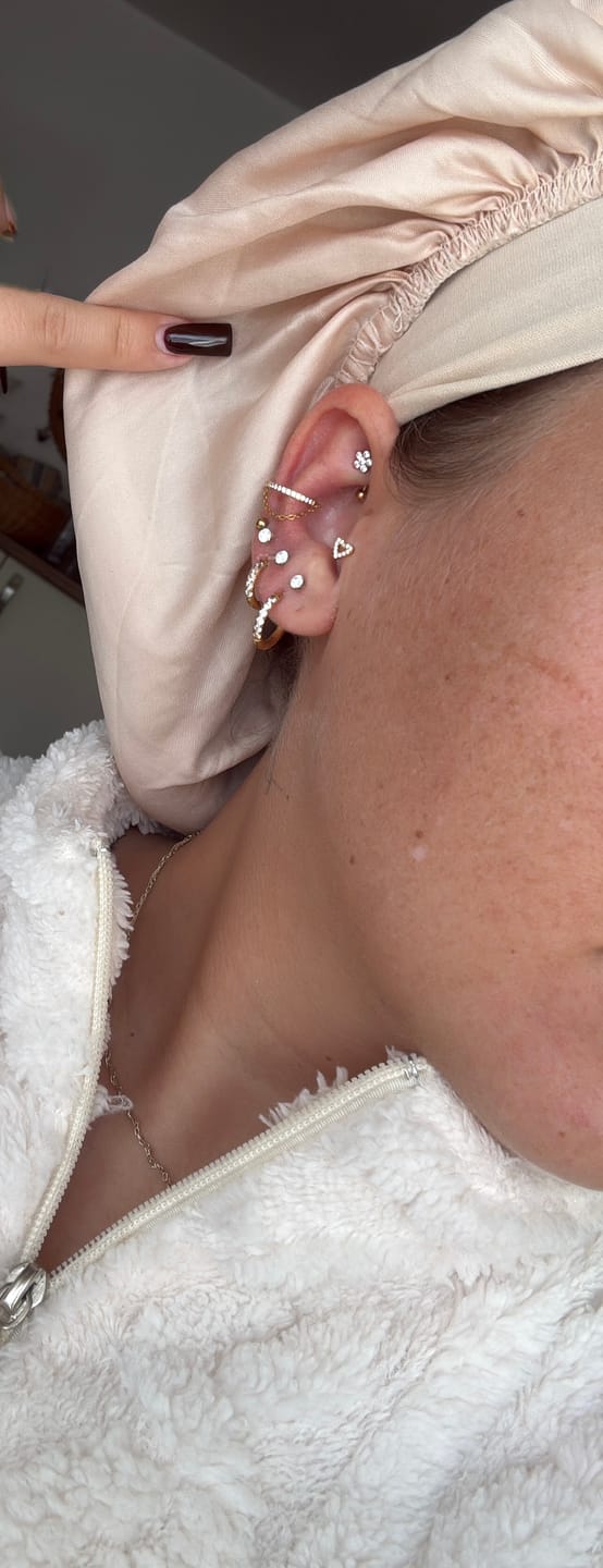 Customer photo review of Flower Rook Piercing | Chirurgenstahl
