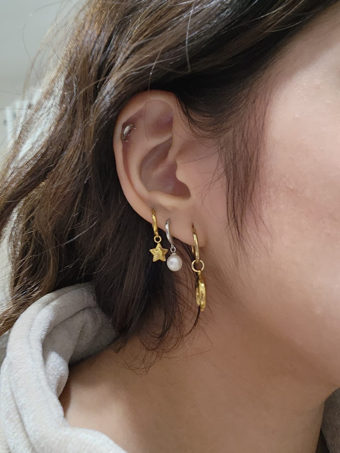 Customer photo review of Par Arracada Con Estrella 20 mm