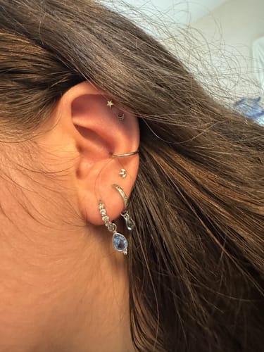 Customer photo review of LUNAIRE Blue Topaz Charm