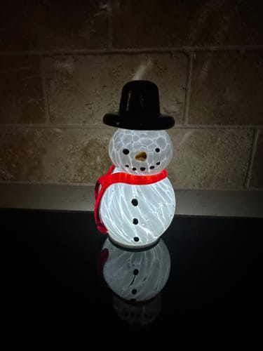 Customer photo review of Grinning 5” Lite-Up Blown Glass Snowman