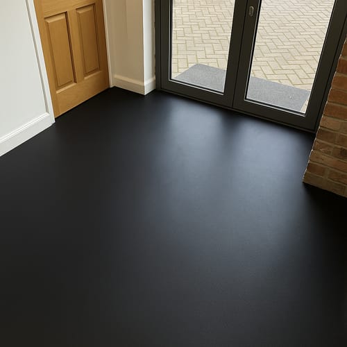 Customer photo review of Heavy Duty Slip-Resistant Plain Black Rubber Safety Flooring