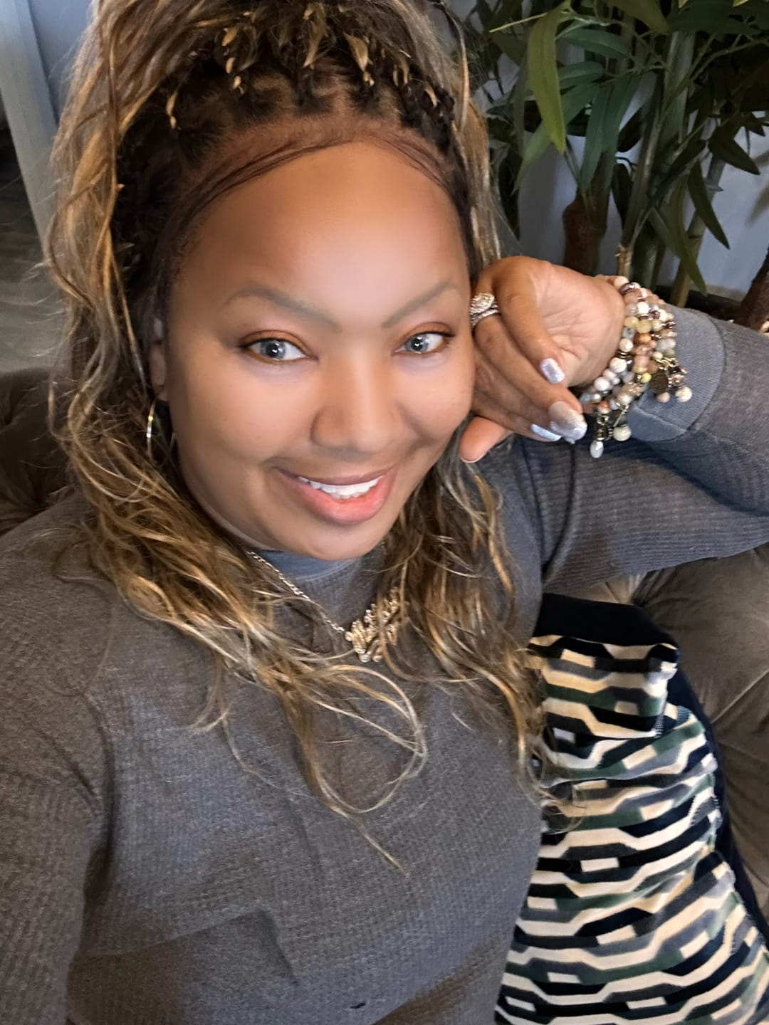 Customer photo review of Michelle - Salon-Style Glueless Miracle Braided Wig Pre-Bleached Swiss HD Full Lace Boho Box Braids Bora Bora Human Hair Body Wave Curls