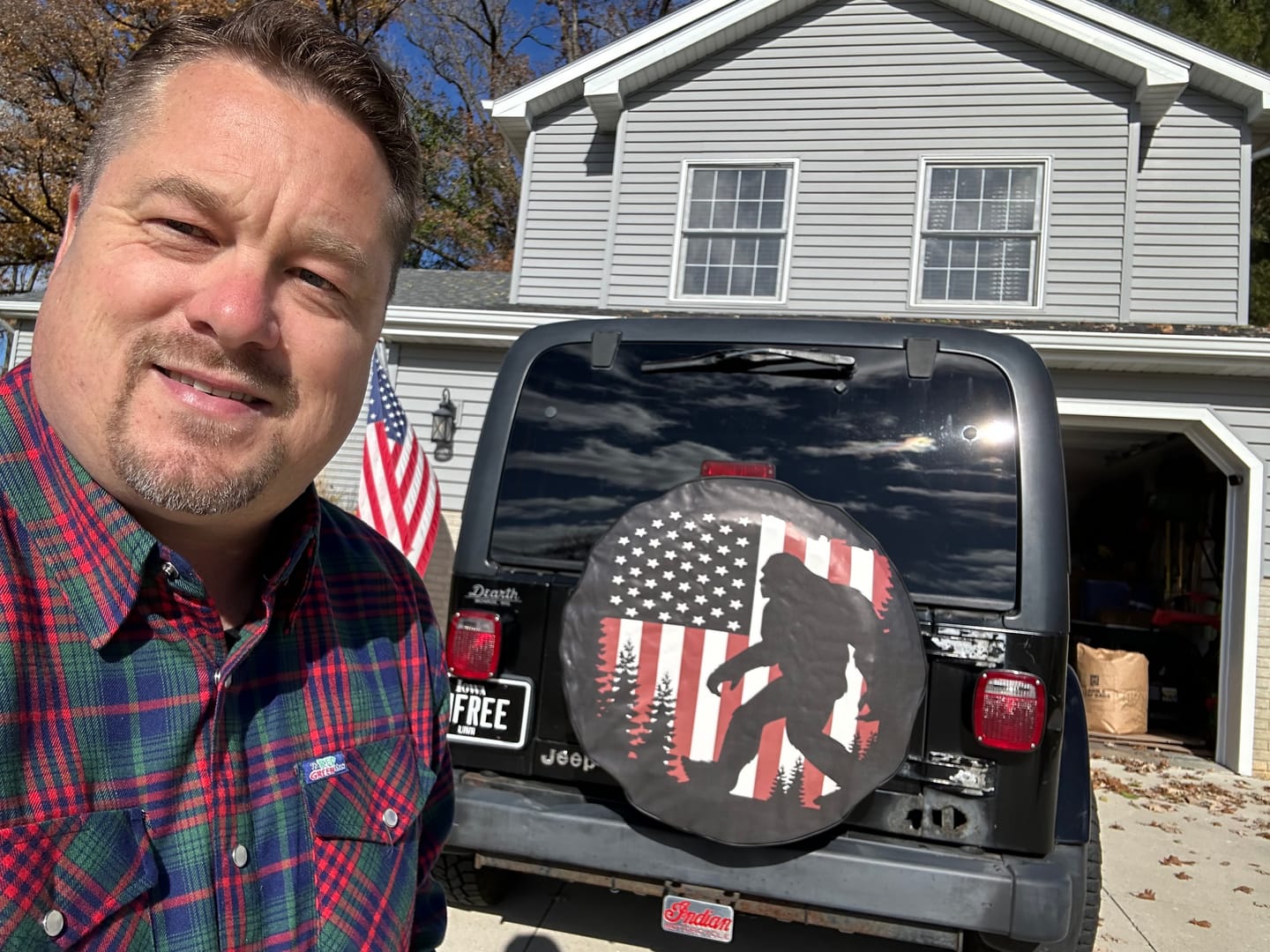 Customer photo review of Bigfoot or Sasquatch American Flag Spare Tire Cover for Bronco, Jeep, Camper, RV, & More