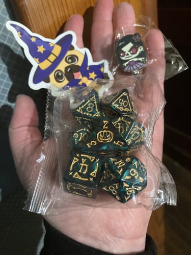 Customer photo review of Fright Night Mystery Dice – Spooky dice, pins and stickers!