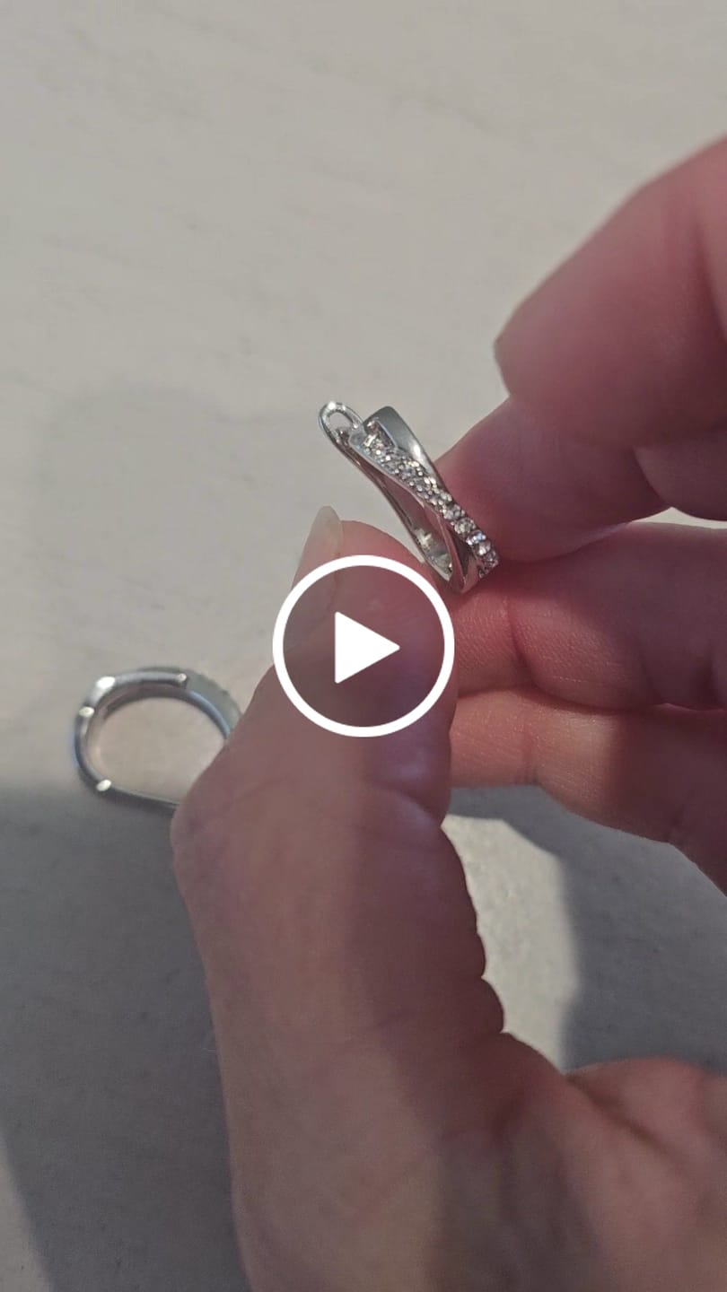 Customer video review of Amaya 18k White Gold Plated 16mm Twisted Hoop Earrings with Swarovski Crystals