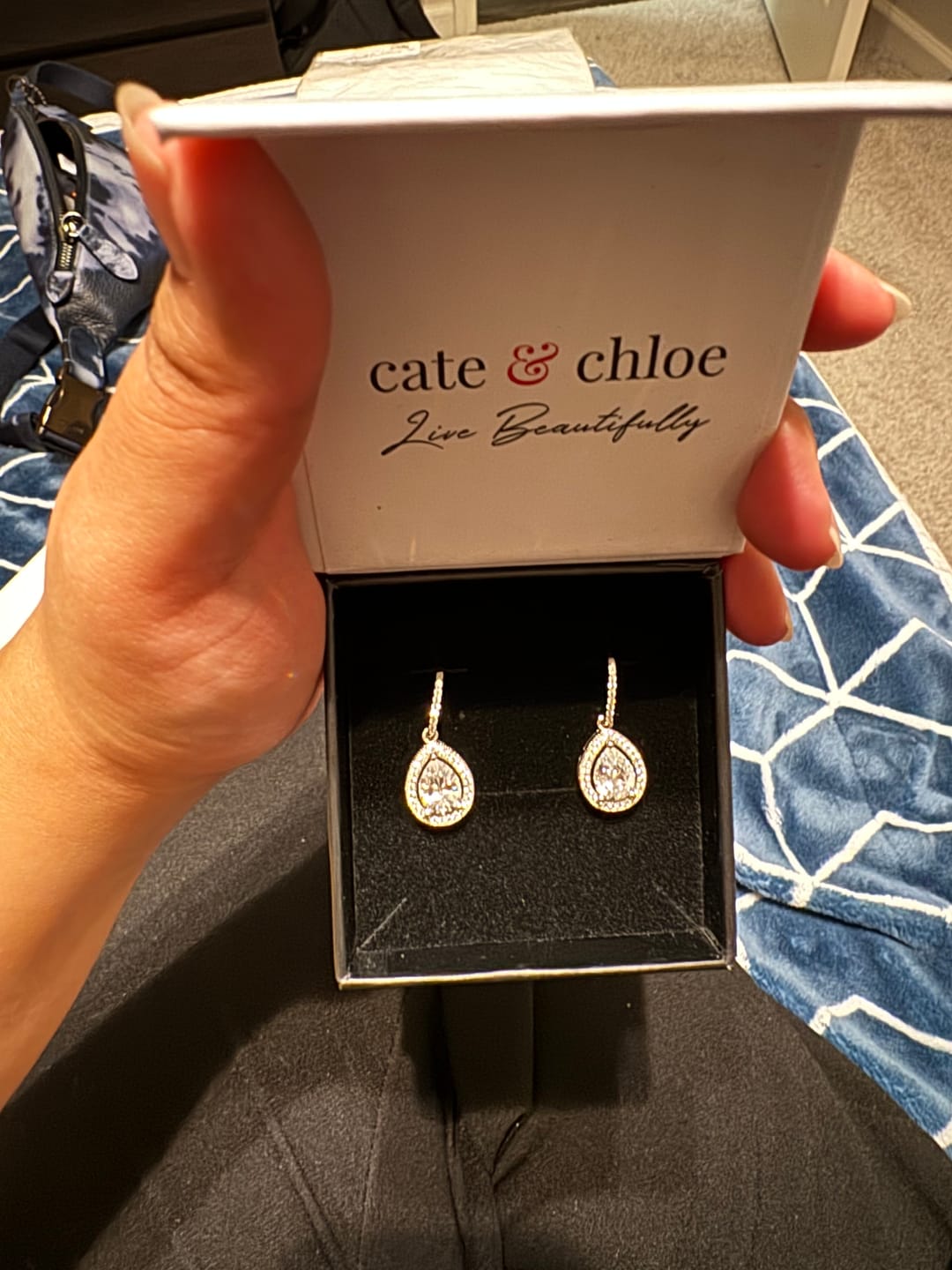 Customer photo review of Isabel 18k White Gold Plated Halo Teardrop Earrings with Simulated Diamond Crystals