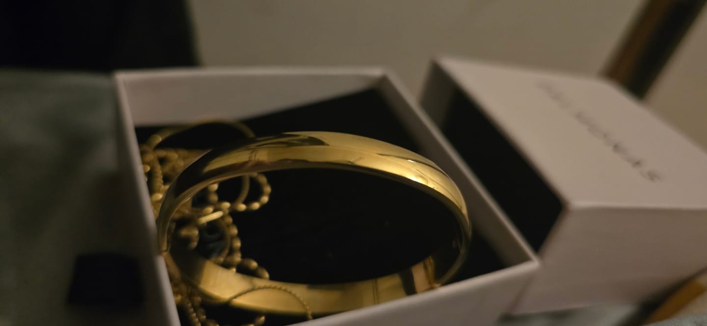 Customer photo review of Plain Gold Bangle Bracelet - 7 mm