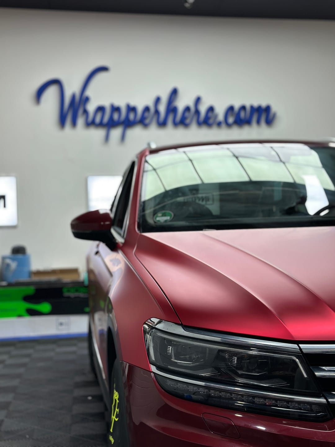 Customer photo review of Satin Chrome Prismatic Red Vinyl Wrap