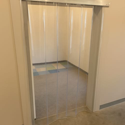 Customer photo review of School Freeflow PVC Curtains (QuickMount) Child-Safe, Clear, Energy-Efficient Strip Curtains for Schools & Nurseries Easy to Install
