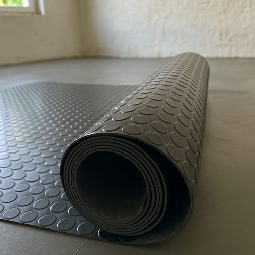 Customer photo review of PVC Flooring Roll – Non-Slip Coin Pattern, Waterproof Mat for Garages, Gyms, Workshops & Industrial Use – Easy to Cut & Install