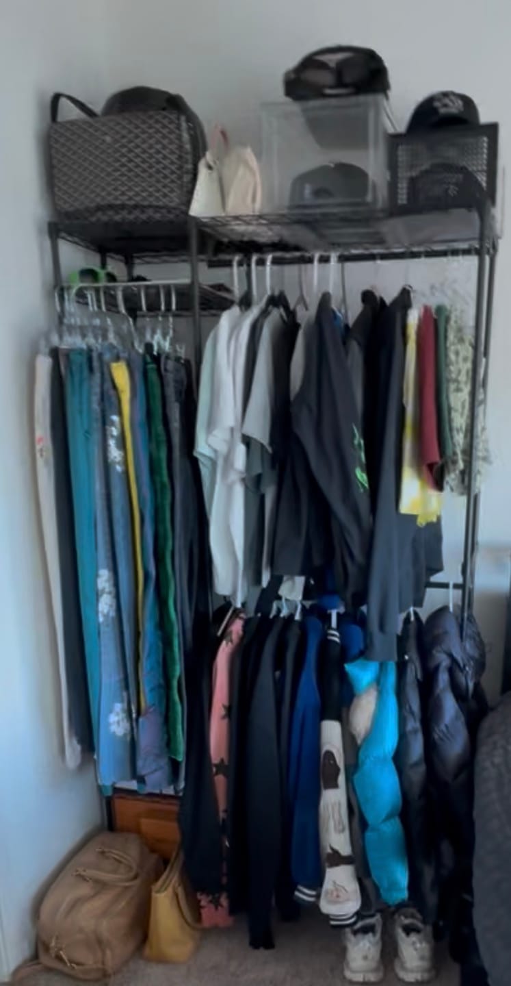 Customer photo review of Raybee Heavy Duty Portable Clothes Rack With Wheels,Clothing Rack For Hanging,Garment Rack For Bedroom