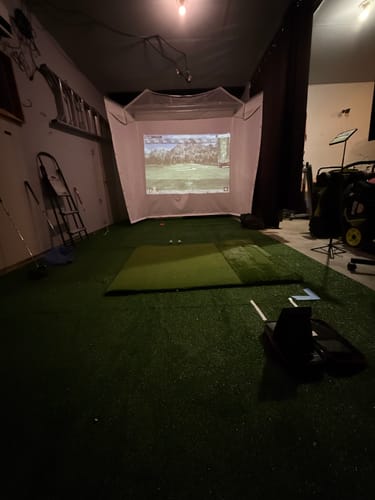 Customer photo review of HomeCourse Pro 180 Retractable Golf Simulator Screen