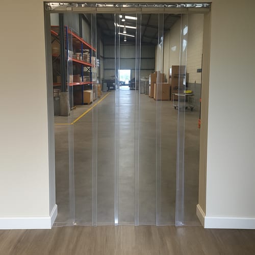 Customer photo review of Warehouse PVC Strip Curtains (Hook On) Clear Energy-Saving Easy Install Stainless Steel Rails Flexible Dust & Noise Control for Personnel & Trolley Use