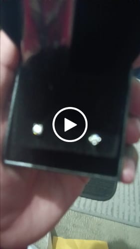 Customer video review of Moissanite VVS D Ideal Cut Stud Earrings in .925 Sterling Silver