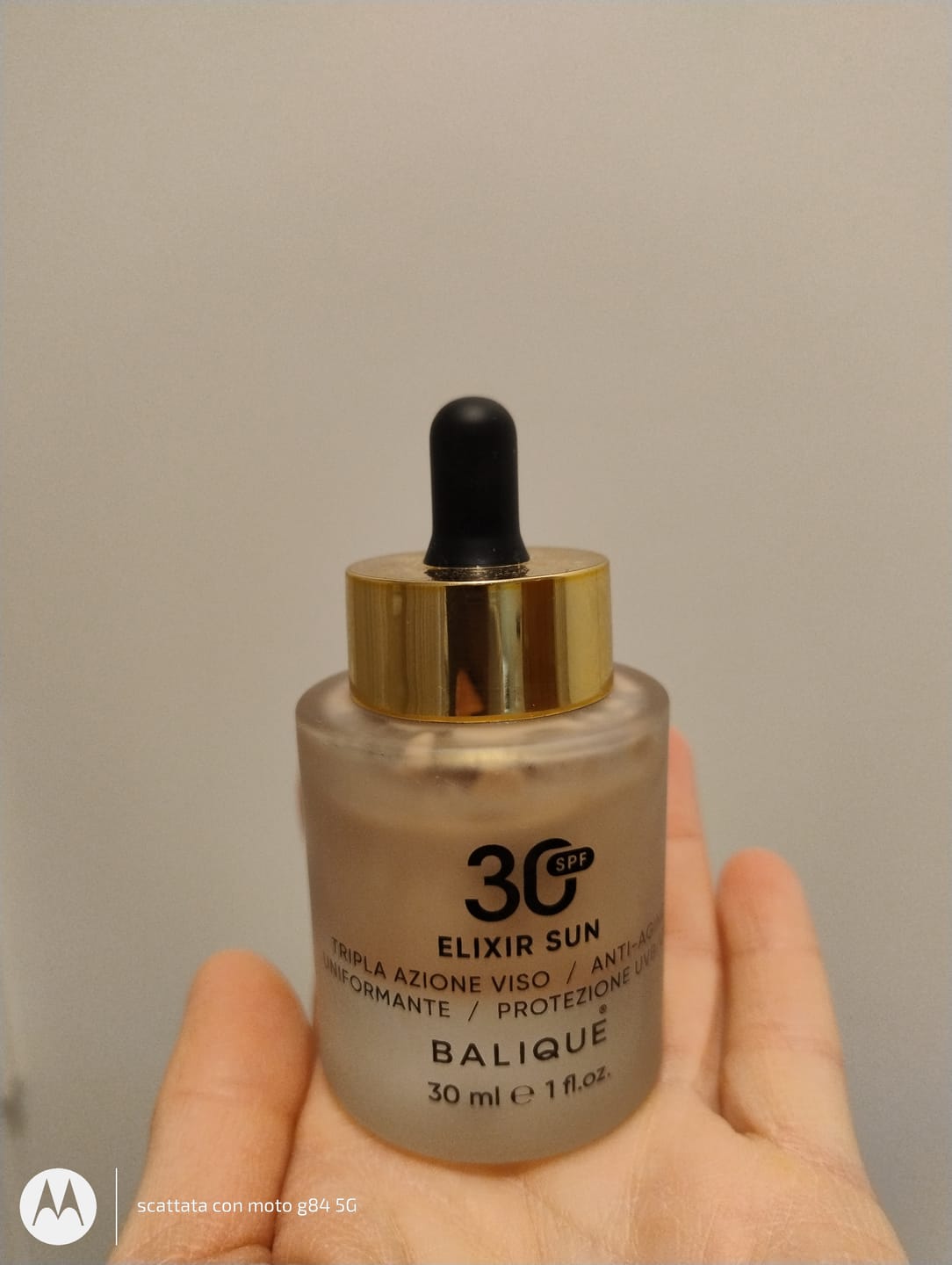 Customer photo review of ELIXIR SUN SPF30 - Siero Viso tripla azione
