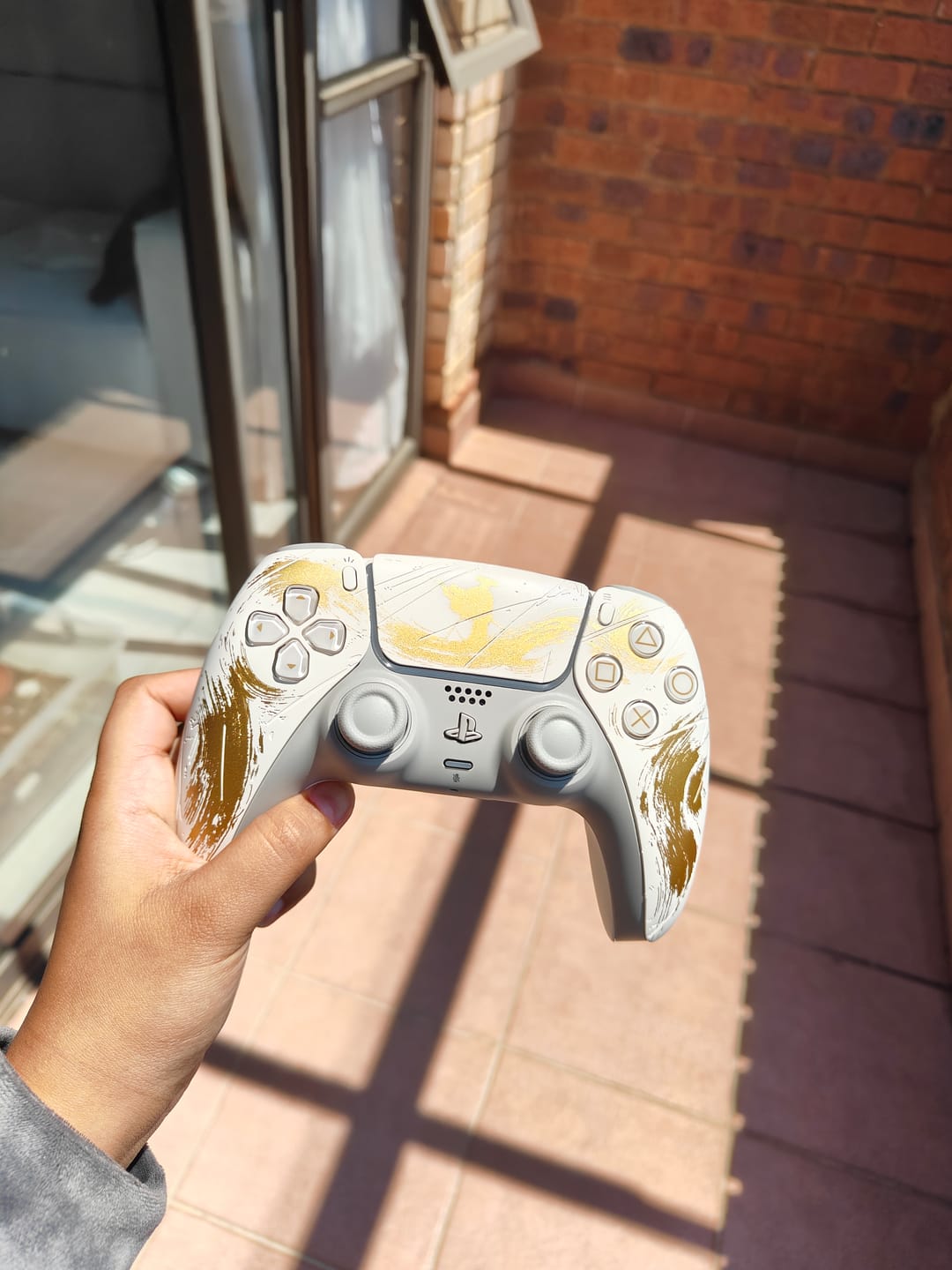 Customer photo review of PlayStation 5 (PS5) DualSense Wireless Controller - Ghost of Yotei Gold Limited Edition
