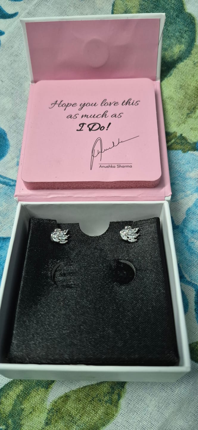 Customer photo review of Manali's Shining Swan Studs