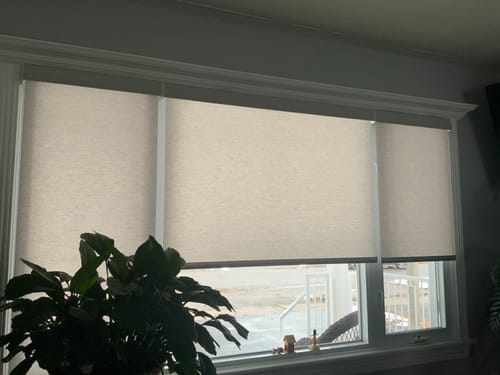 Customer photo review of SmartWings Motorized Light Filtering Roller Shades 70% Blackout Safari