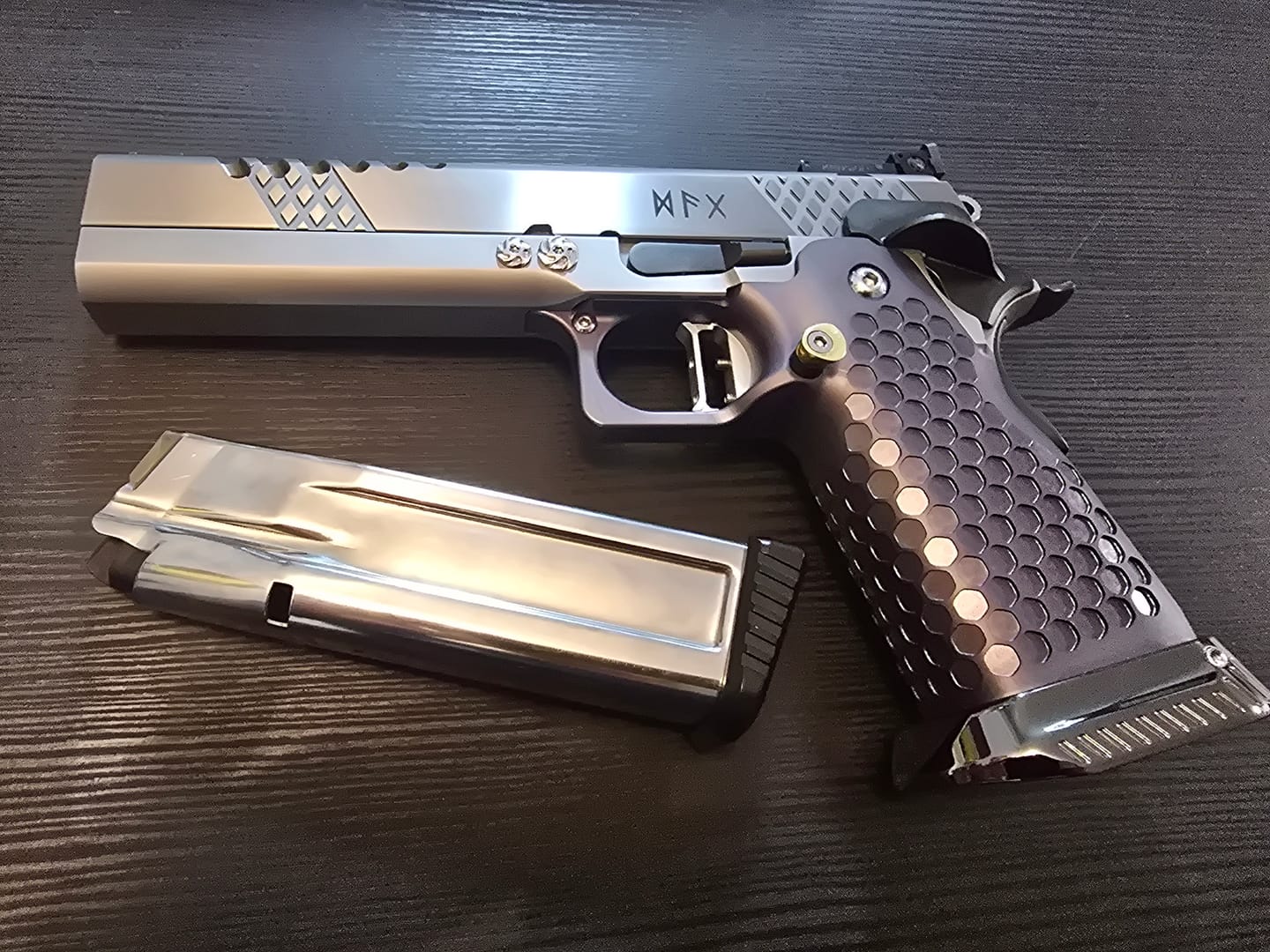 Customer photo review of STI 2011 9/38/BUL Armory | Brass | Double Stack Magazine Base Pad | IPSC Standard Division
