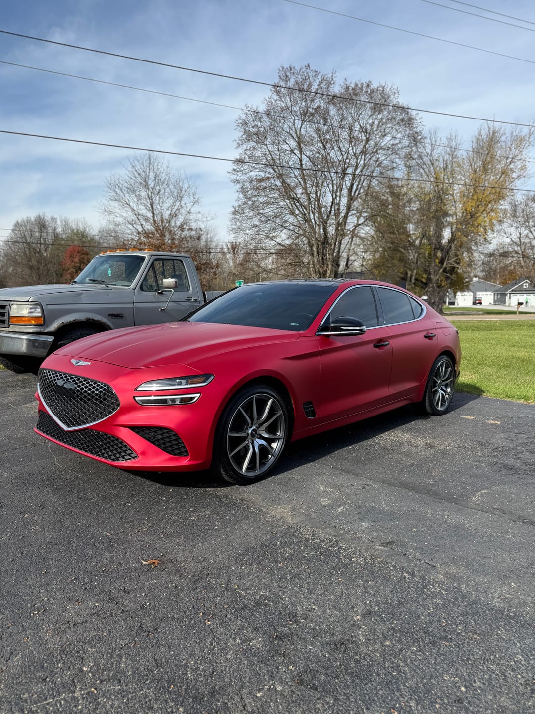 Customer photo review of Satin Chrome Prismatic Red Vinyl Wrap