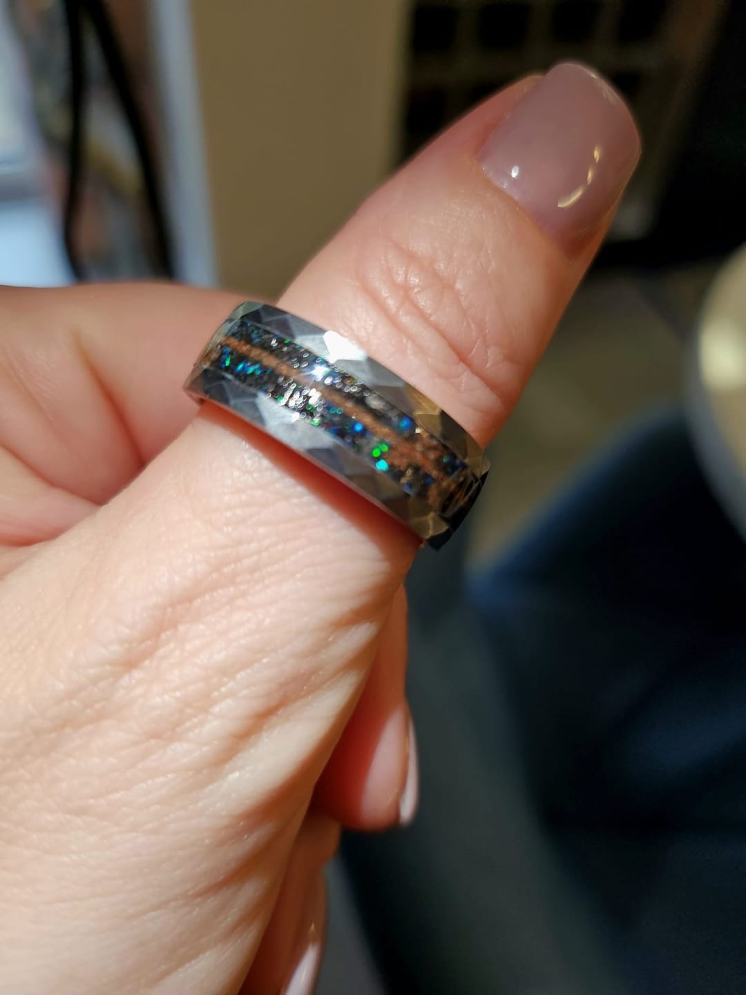 Customer photo review of Hammered tungsten ring fileld with Muonionalusta mixed with meteorite dust and Trex dinosaur bone 8 mm for Christopher
