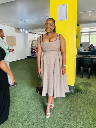 Felicia T. review of Big Back Bow Custom Pleated Midi Dress image 1 out of 1