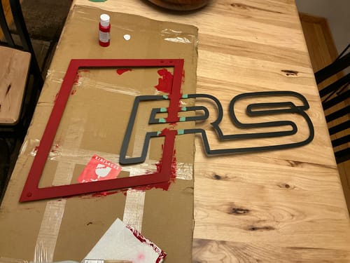 Customer photo review of RS Logo Metal Wall Art