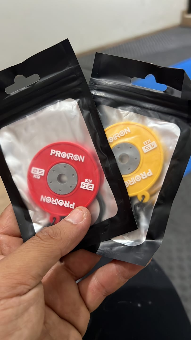 Customer photo review of Set Barra Olímpica PRO + 100KG de Discos Bumpers Negros