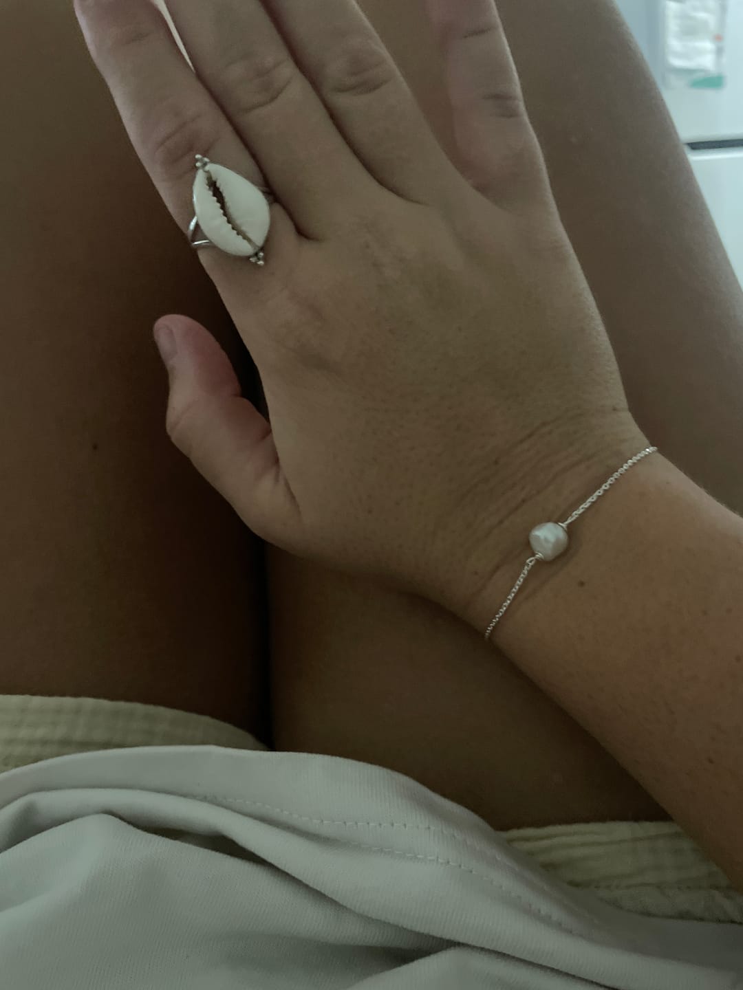 Customer photo review of Kira Cowrie Shell Ring