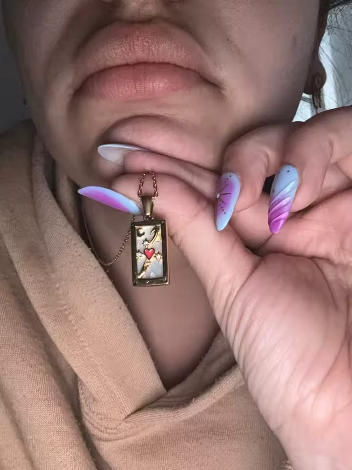 Customer photo review of Aura Tarot Necklace