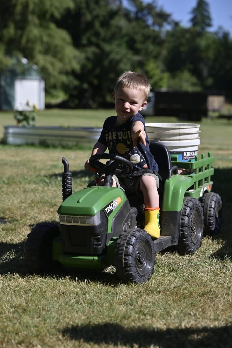 Customer photo review of TOBBI 12V Electric Kids Ride-On Tractor with Trailer