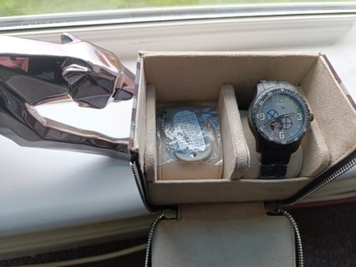 Customer photo review of *Iron Wolf Mother of Pearl Military Open-Heart Watch 82S7-P714301
