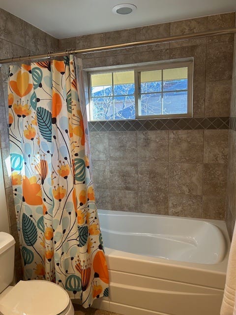 Customer photo review of Floral Happiness Shower Curtain - Turquoise & Orange