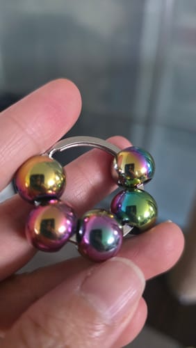Customer photo review of The Galaxy Oil Slick Fidget