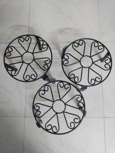 Customer photo review of UnitedCrafts Trivia Metal Pot Stand High Quality & Unique Design
