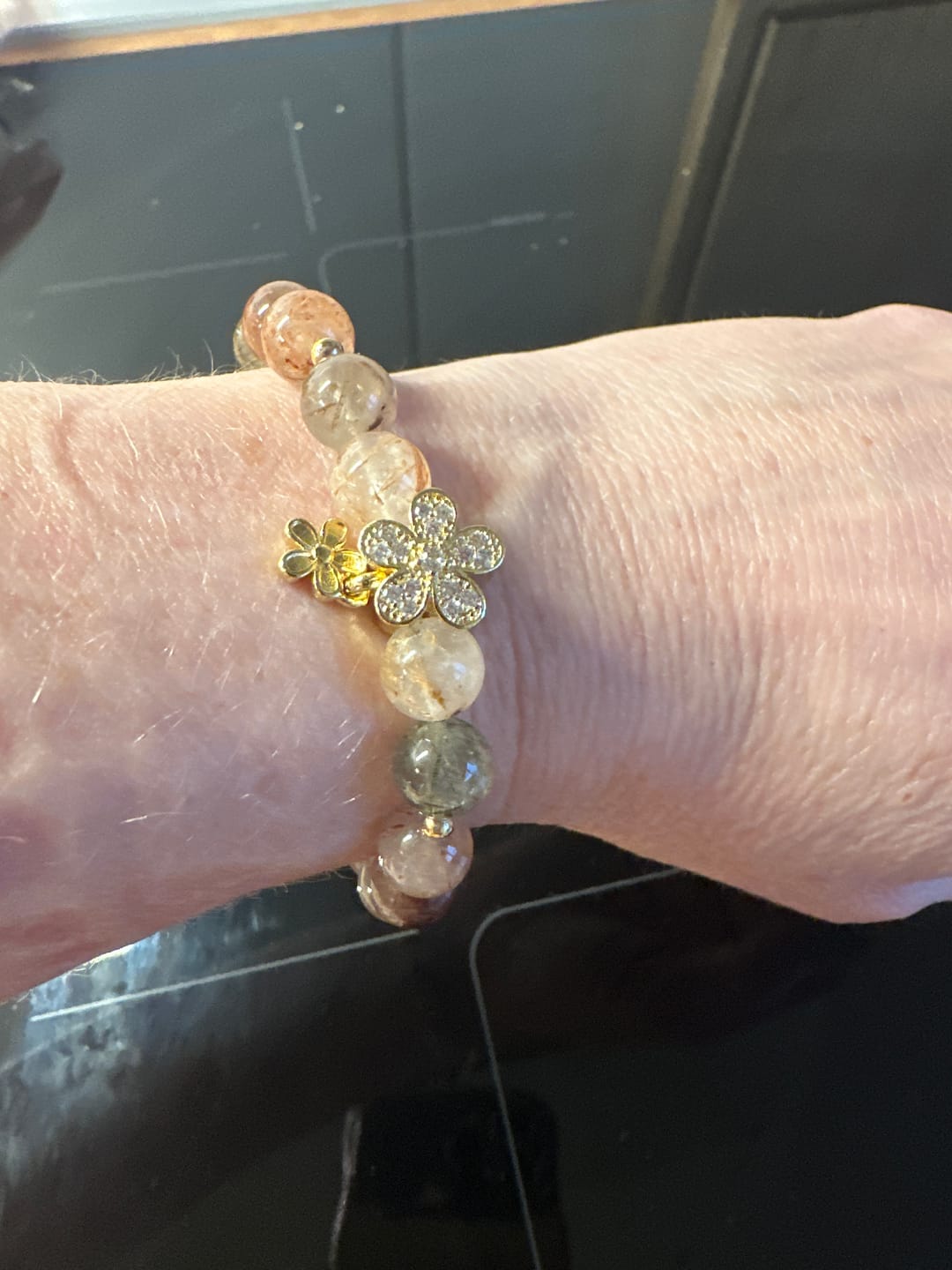 Customer photo review of Multicolored Rutilated Quartz Citrine Wealth Protection Flower Bracelet